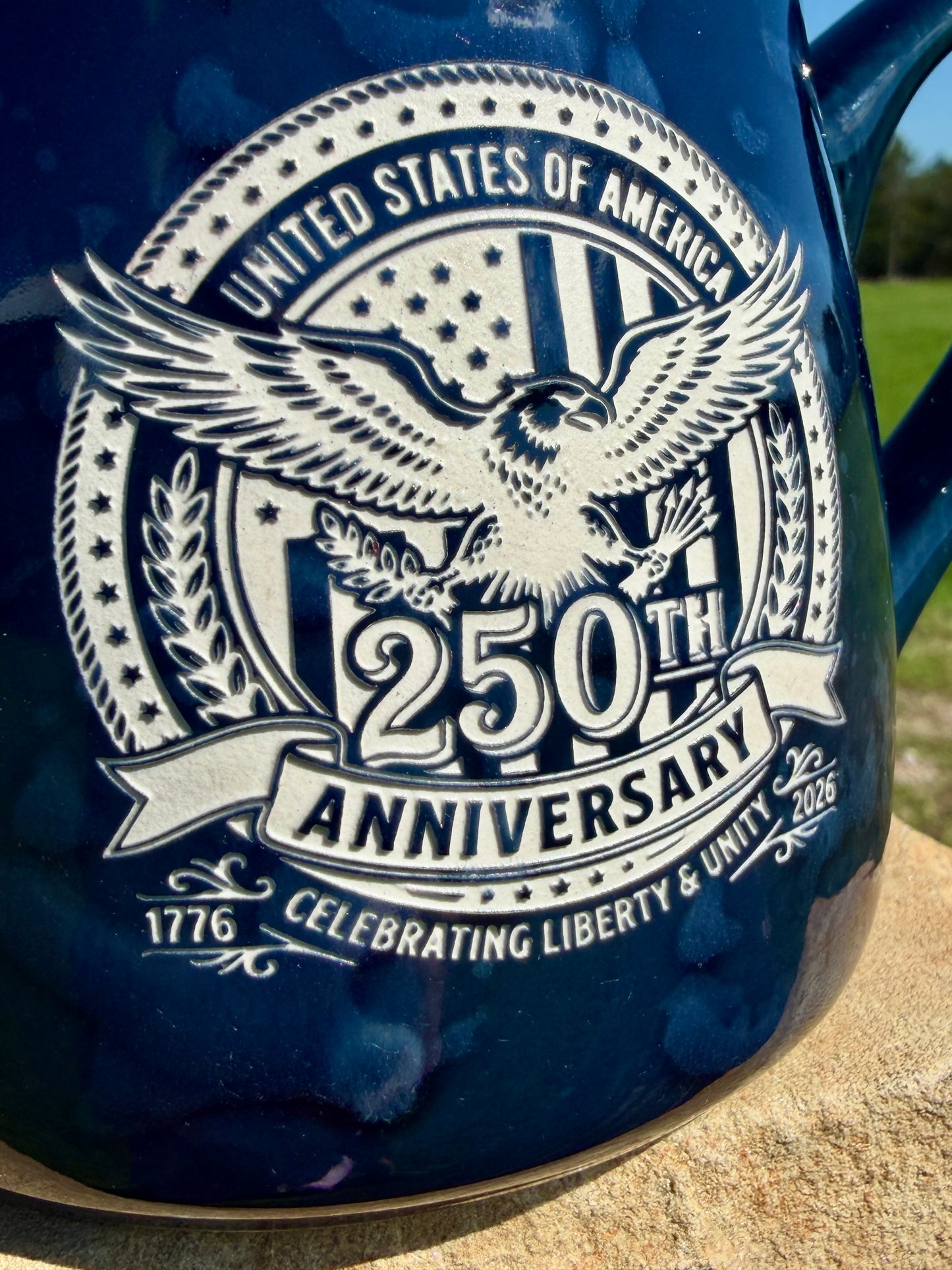 Blue mug with 250th Anniversary of the United States design featuring an eagle and American flag.